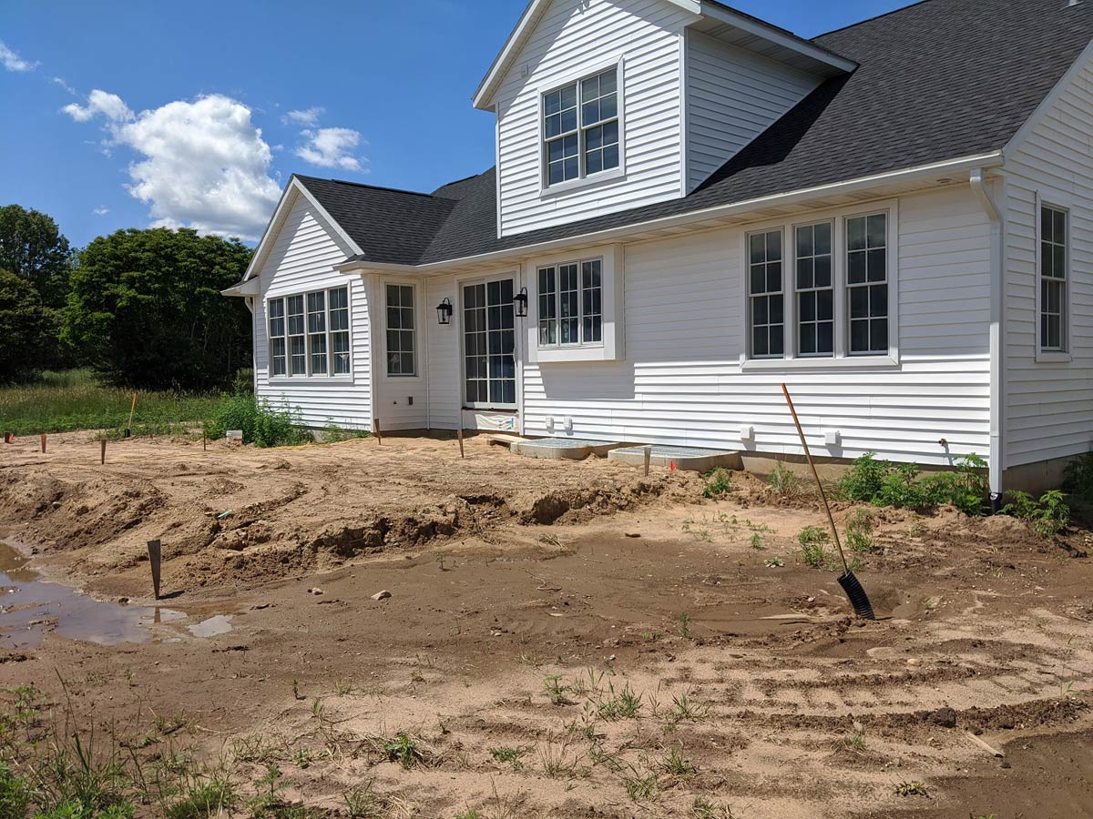 home with newly excavated lawn area